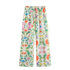 Women's wide palazzo pants with drawstring waistband and floral embroidery look Fashion Glam