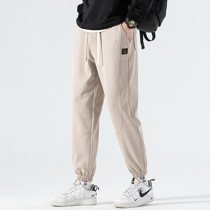 Men's Loose Fit Jogging Pants with Drawstring, Elastic Waistband and Sewn Knee Areas Fashion Glam