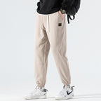 Men's Loose Fit Jogging Pants with Drawstring, Elastic Waistband and Sewn Knee Areas Fashion Glam