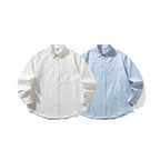 Unisex Oversized shirt with button-down collar, chest pocket and rounded hem Fashion Glam