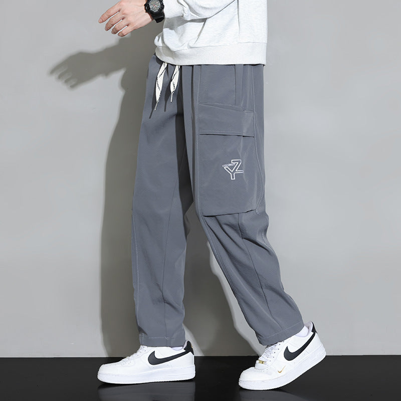 Men's loose-fitting cargo joggers with large flap pocket and drawstring Fashion Glam