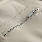 Unisex Boxy transitional jacket with high stand collar, contrasting panels and zip pockets Fashion Glam
