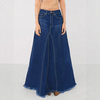 Women’s high-waisted A-line denim maxi skirt with decorative seams and raw fringe hem Fashion Glam
