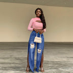 Ladies tapered denim jeans with high side slits and destroyed knee area Fashion Glam