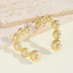 Women's bracelet with structured, golden beads Fashion Glam