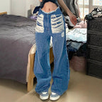 Women's high-cut wide denim jeans with heavily distressed front and raw waistband Fashion Glam