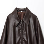 Women's short-cut oversized blouse jacket made of vegan leather with shirt collar and elastic hem Fashion Glam