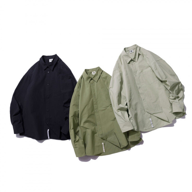 Unisex Oversize Shirt made of lightweight cotton blend with dropped shoulder and chest pocket Fashion Glam