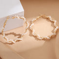 Ladies hoop earrings with luxurious pearl accents and elegant, twisted design Fashion Glam