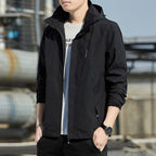 Men's Lightweight Hooded Softshell Jacket with Windproof Membrane and Minimalist Urban Cut Fashion Glam