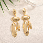 Women Hanging Earrings with artistic, three-dimensional design Fashion Glam