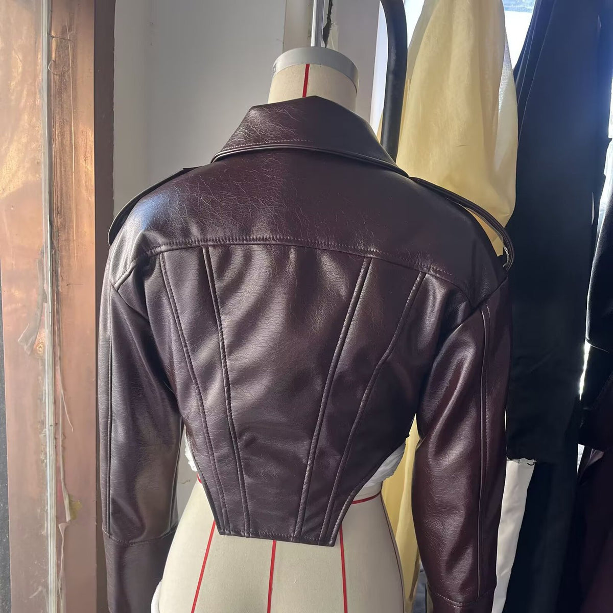 women's short-cut faux patent leather blouson with tailored corset cut Fashion Glam