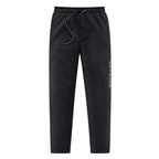 Men's Sportive Jogging Pants in Tapered Fit with Drawstring and Elastic Cuffs Fashion Glam