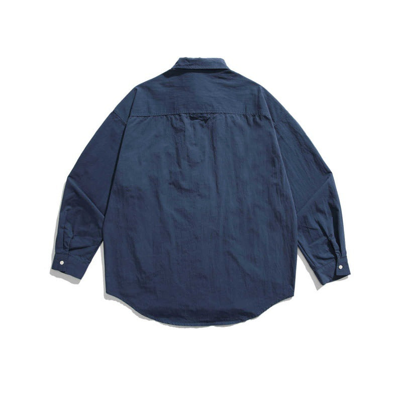 Unisex Boxy Overshirt Jacket with utility pockets, rounded hem, and oversized fit Fashion Glam