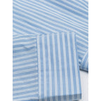 Women's oversized shirt with fine stripes, breast pocket, and rounded hem Fashion Glam