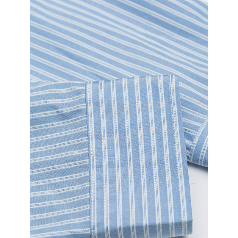 Women's oversized shirt with fine stripes, breast pocket, and rounded hem Fashion Glam