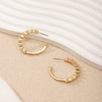 Ladies hoop earrings with intricate structures Fashion Glam