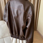 Women's Boxy Faux Leather Pilot Jacket with Flap Pockets and Elastic Hem Fashion Glam