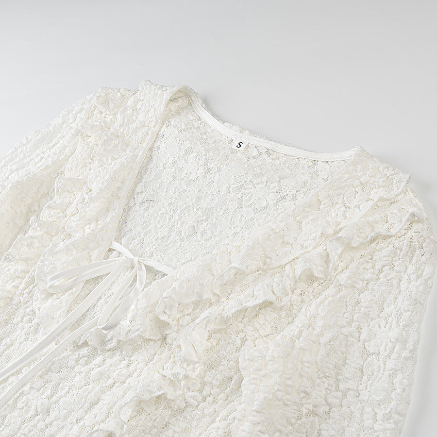 Ladies figure-hugging lace blouse with ruffle V-neck and tie detail Fashion Glam
