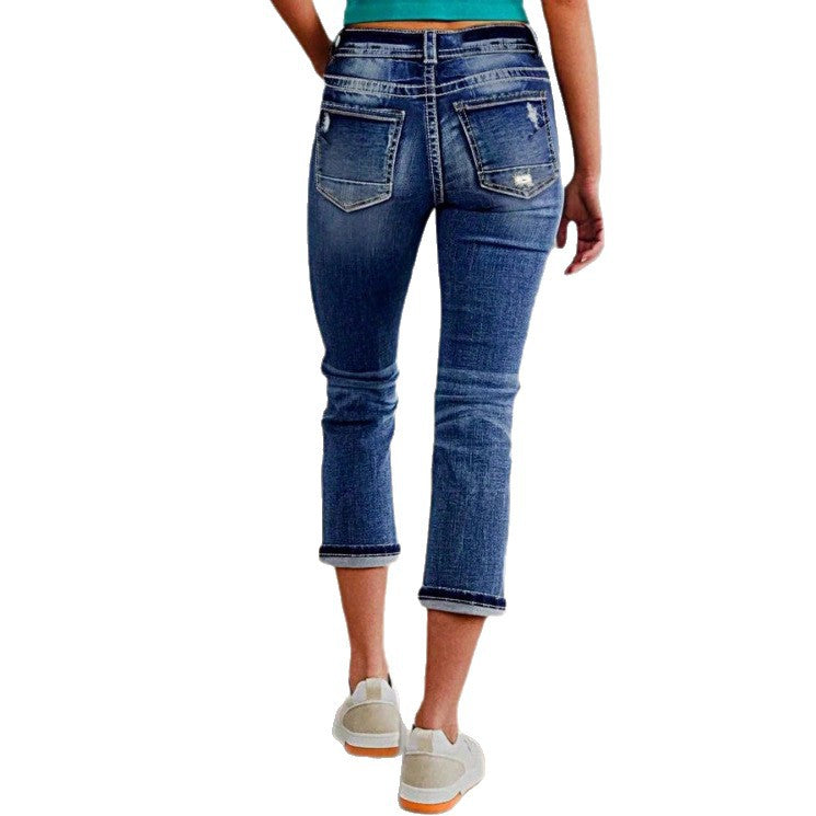 Women's cropped jeans with turn-up, mid-rise waist and used wash Fashion Glam