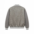 Men's varsity bomber jacket in college style made of faux leather with appliqués Fashion Glam