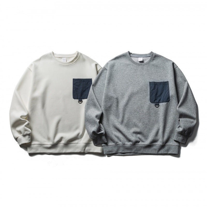 Unisex Oversized Sweatshirt with applied chest pocket and D-ring Fashion Glam