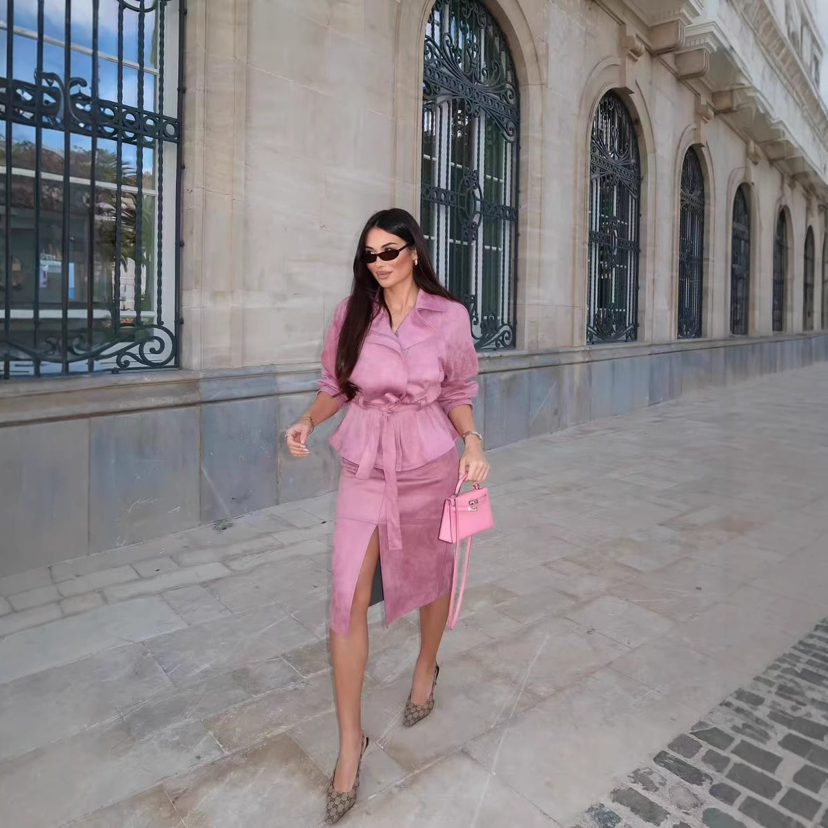 Women's short jacket with belted waist, asymmetrical lapel, and peplum hem Fashion Glam