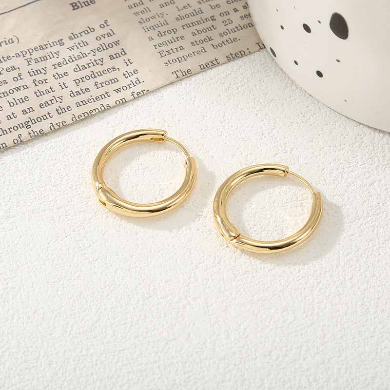 Women's hoop earrings with modern, textured design Fashion Glam