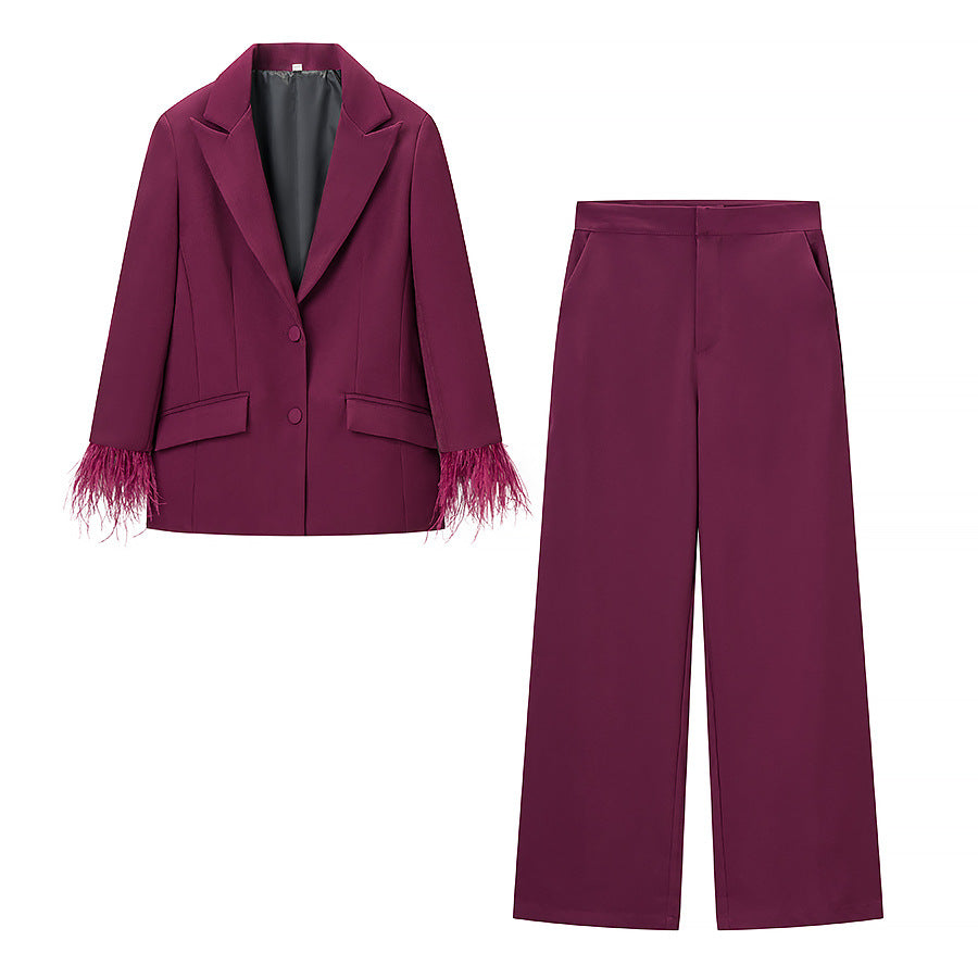 Ladies tailored tuxedo pant suit with feather embellishments at the cuffs Fashion Glam