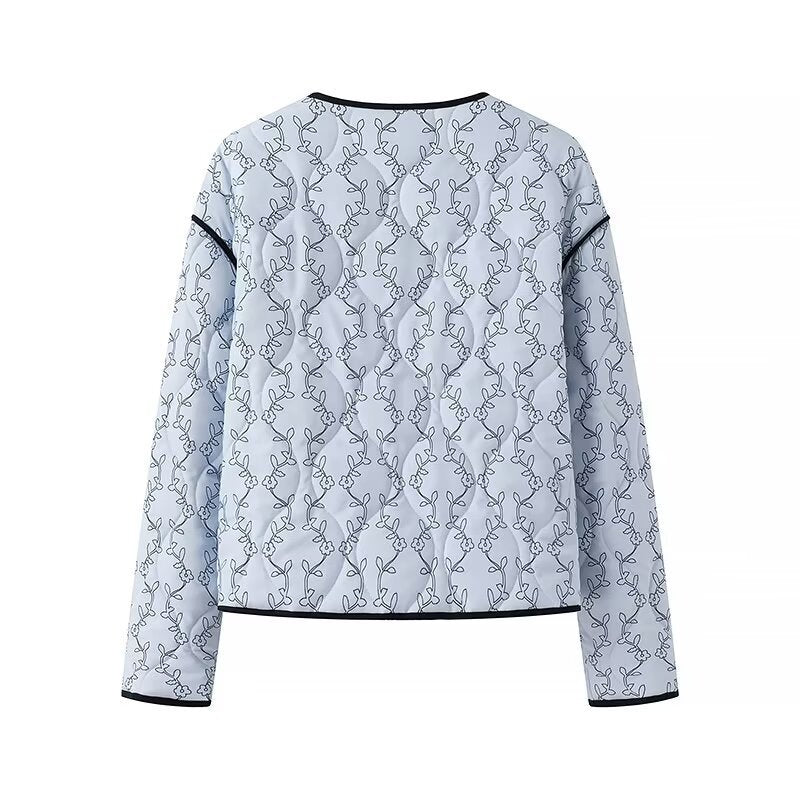 Women's lightweight quilted blouse jacket with V-neck, contrast piping and floral line print Fashion Glam