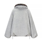 Women's short coat made of textured faux fur with voluminous contrasting collar and boxy silhouette Fashion Glam