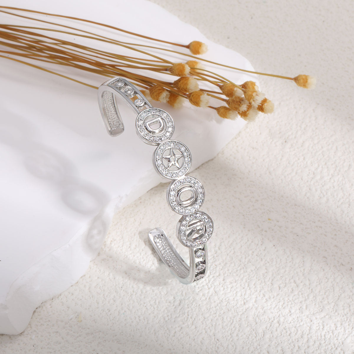 Ladies bracelet with elaborate infinity symbol and sparkling zirconia Fashion Glam