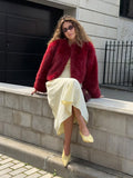 Women's short jacket made of luxurious faux fur with shaggy look and boxy silhouette Fashion Glam