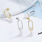 Women's stud earrings with modern oval design and elegant pearls Fashion Glam