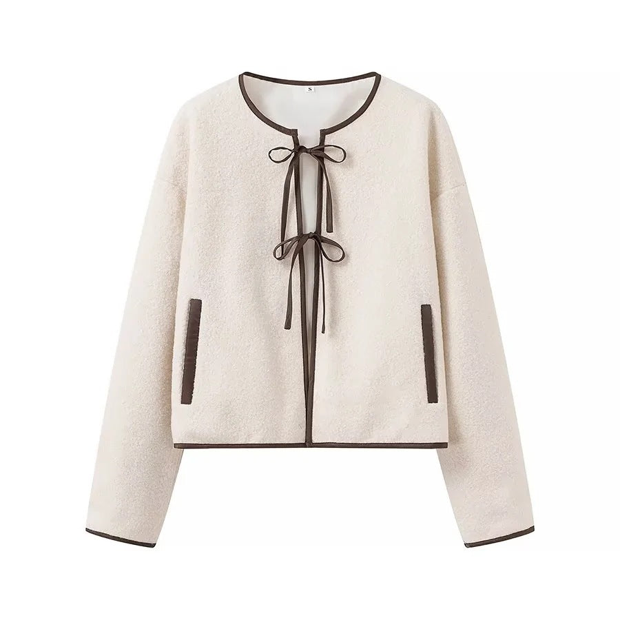 Women's short jacket in teddy look with decorative ribbons and contrasting piping Fashion Glam
