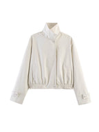 Ladies short jacket with high stand-up collar, elastic waistband and concealed snap button placket Fashion Glam