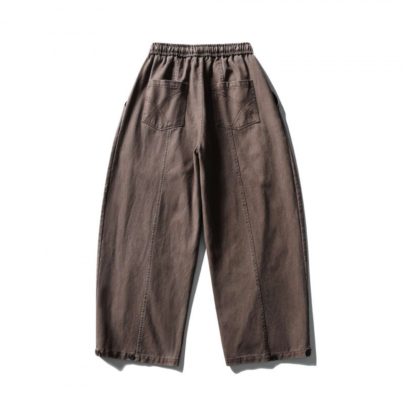 Unisex wide balloon pants made of cotton blend with drawstring waistband and decorative darts Fashion Glam