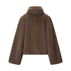 Ladies short jacket made of voluminous faux fur with high collar and boxy silhouette Fashion Glam