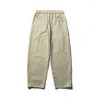 Unisex locker cut cropped leisure pants with elastic waistband, drawstring, and carabiner detail Fashion Glam