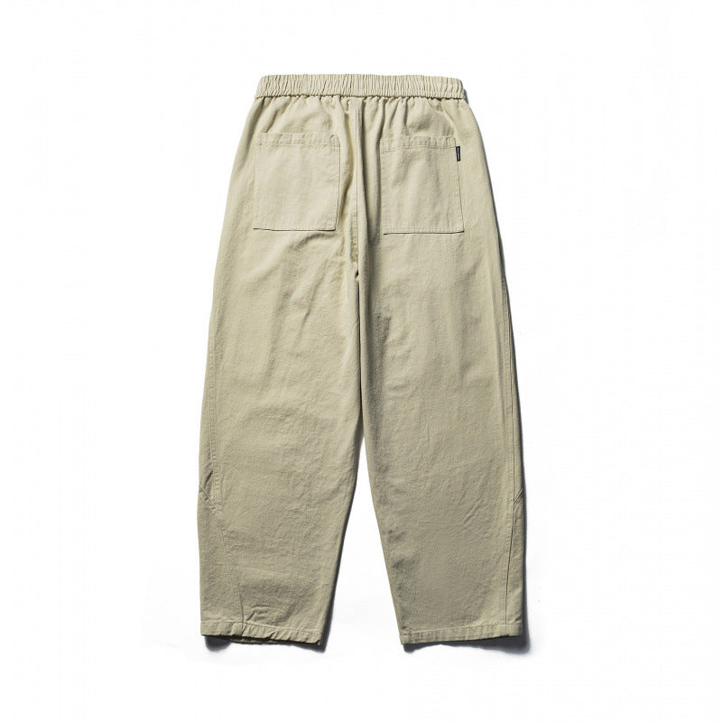 Unisex locker cut cropped leisure pants with elastic waistband, drawstring, and carabiner detail Fashion Glam