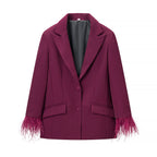 Ladies tailored tuxedo pant suit with feather embellishments at the cuffs Fashion Glam
