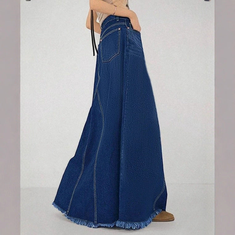 Women’s high-waisted A-line denim maxi skirt with decorative seams and raw fringe hem Fashion Glam