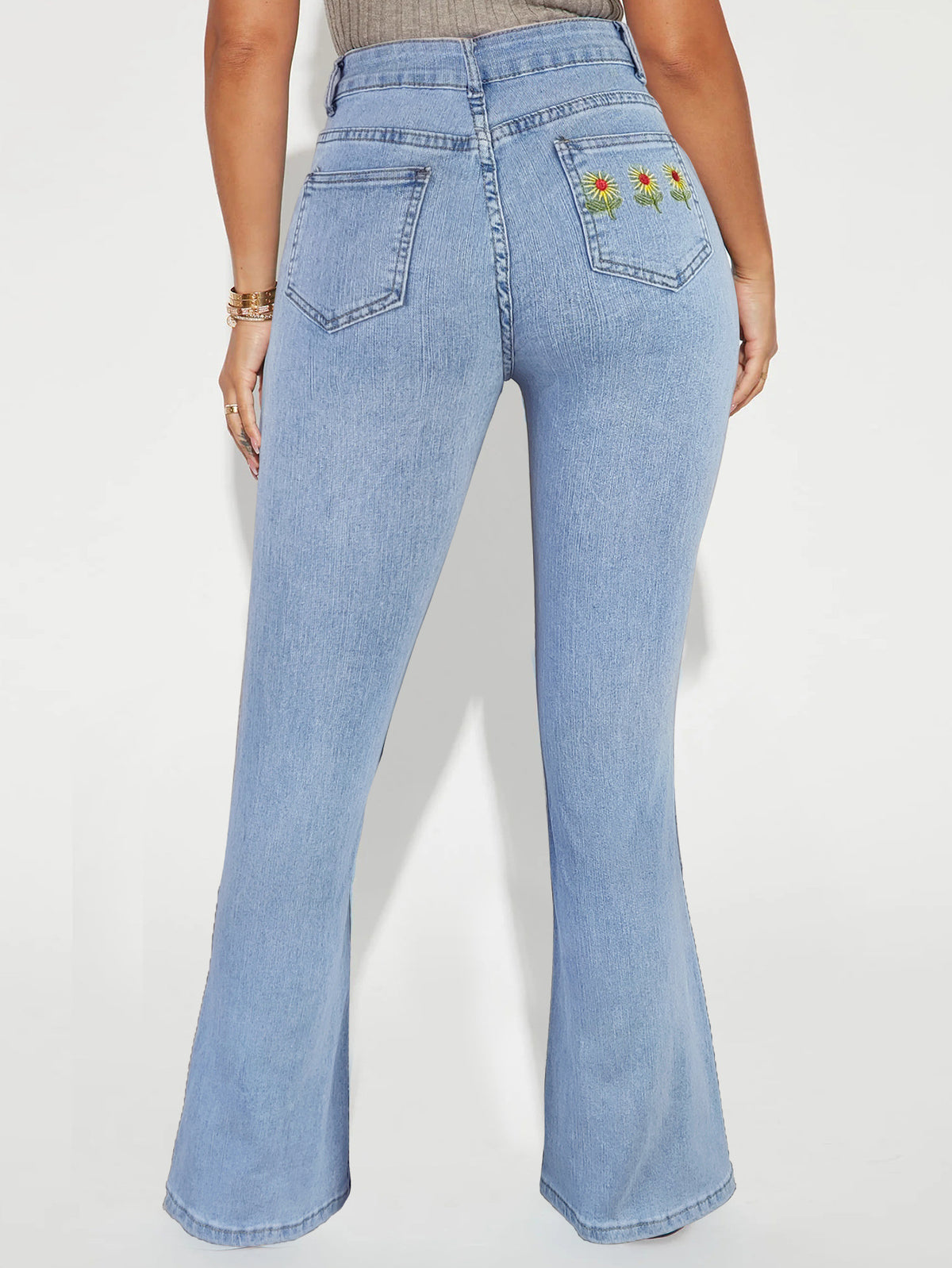 Women's high-waisted flared jeans with daisy embroidery and shaping cut Fashion Glam