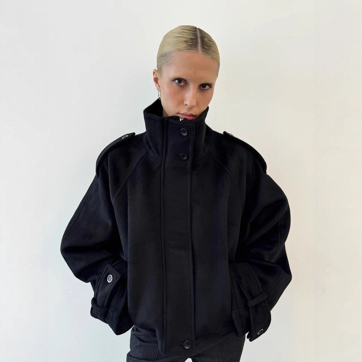 Women's short jacket made of wool blend with high stand-up collar, balloon sleeves and shoulder flaps Fashion Glam