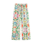Women's wide palazzo pants with drawstring waistband and floral embroidery look Fashion Glam