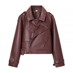 Ladies short cut biker jacket made of faux leather with asymmetrical front and waist belt Fashion Glam