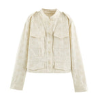 Women's short jacket made of lace embroidery with stand-up collar, utility pockets, and boxy cropped silhouette Fashion Glam