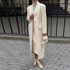 Women's tailored long coat with shawl collar and peplum waist Fashion Glam