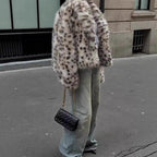 Women's short jacket made of synthetic fur in Dalmatian look with boxy silhouette and wide shawl collar Fashion Glam