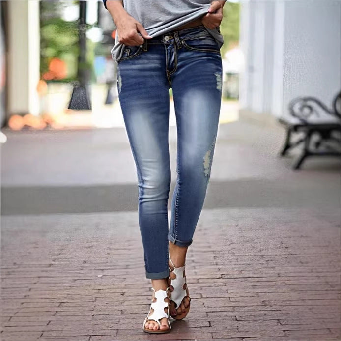 Women's Cropped Slim-Fit Denim Pants with mid-rise waist, cuffed hem and subtle used look Fashion Glam